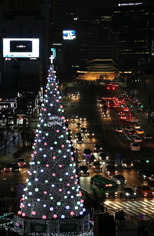 The 25-meter Christmas tree at Seoul Plaza is lit up until Jan. 7, 2018.