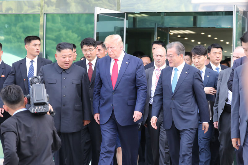 The leaders of the two Koreas and U.S. President Donald Trump today made history by gathering at the truce village of Panmunjeom. There, Trump and Kim held their third bilateral talks for about an hour. (Yonhap News)