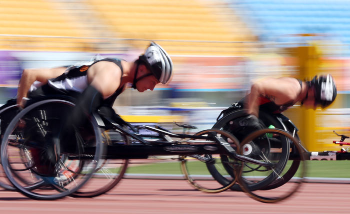 Finalists in the 100-meter wheelchair race for wounded veterans compete in the 2015 CISM World Games on Oct. 5.
