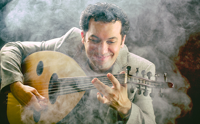 Ahmad Shamma plays the <i>oud</i>, an Iraqi traditional musical instrument, introducing traditional Arab folk songs to visitors at the 10th Arab Culture Festival.
