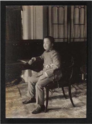 King Yeongchin sits on a chair in the Seokjojeon Building of Deoksugung Palace in 1911.