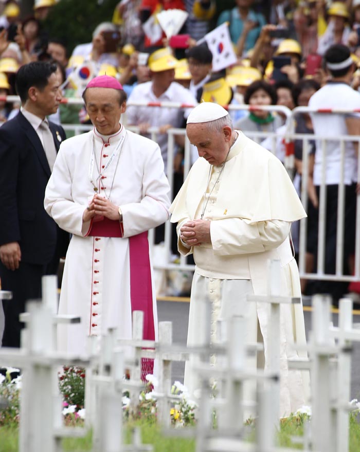  Pope Francis visits a memorial dedicated to fetuses that were never able to see the world because of abortion and prays for their souls, on August 16. 