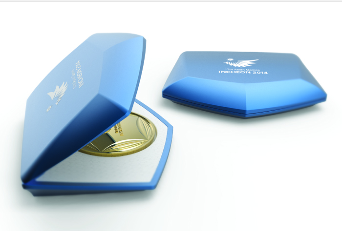  Medals for the 2014 Asian Games in Incheon, the front and back of the medals and medal cases for the medals. (photos courtesy of the 2014 Incheon Asian Games Organizing Committee) 