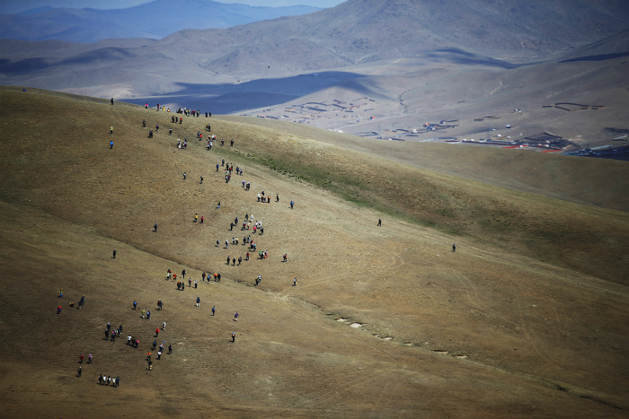 Hikers trek along the Jeju Olle hiking trail's sister trail, the Mongol Olle Route 1, which connects Henhor Village near Ulaanbaatar and the Bogd Khan Mountains, on its opening day on June 18.