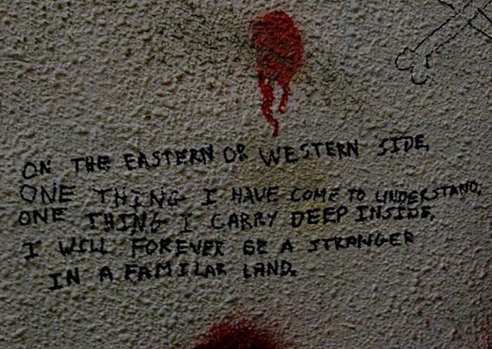 On the eastern or western side/ One thing I have come to understand/ One thing I carry deep inside/ I will always be a stranger/ In a familiar land.