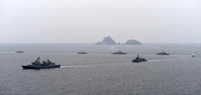 Naval vessels and a patrol ship participate in a defensive drill around the Dokdo Islets, organized by the Korean navy. 