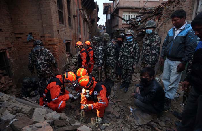 A Korean rescue team carries out search and rescue operations using an endoscope in the city of Bhaktapur, near Kathmandu, in Nepal.