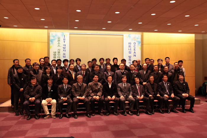 Participants in the OCEAN launch ceremony pose for a photo. 