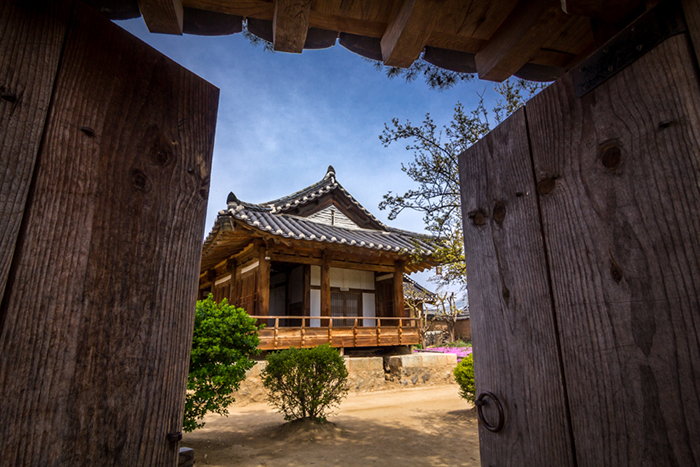 Petit shows some of his photos of Noryangjin Station in Seoul and of the Andong Hahoe Folk Village. (Benjamin Petit)