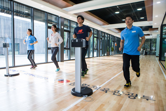 Participants in the National Fitness Award Project receive a blood pressure examination, a test of explosive muscle strength, a flexibility exam, a muscular endurance test and a cardiovascular endurance test.