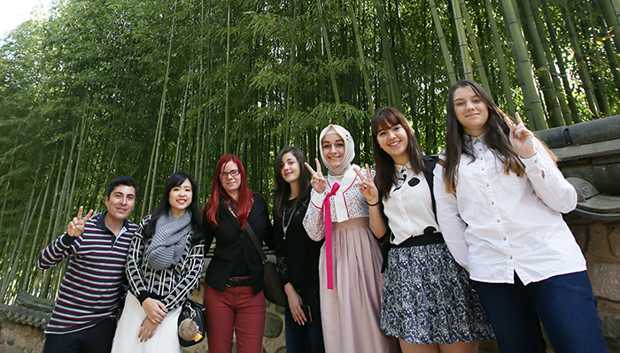 The winners of the Talk Talk Korea contest in 2015 pose for a photo during their trip to Korea.