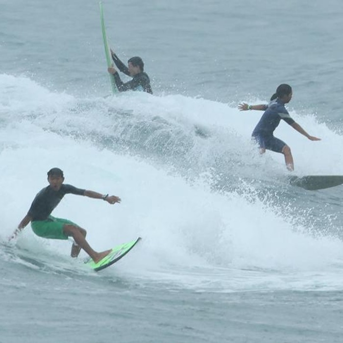 Surfing at Jeju Island's Jungmun Saekdal Beach