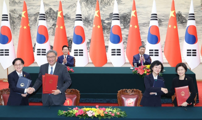 한중, 상업장관 회의 정례화···기술혁신·환경 등 MOU 14건 체결