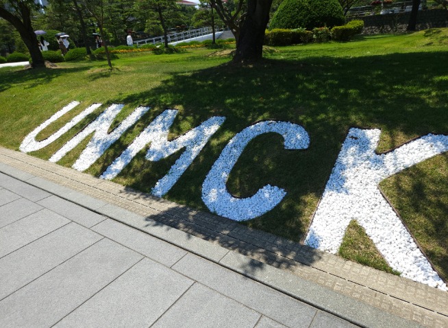 Why do Korean War veterans request burial at a Busan cemetery?