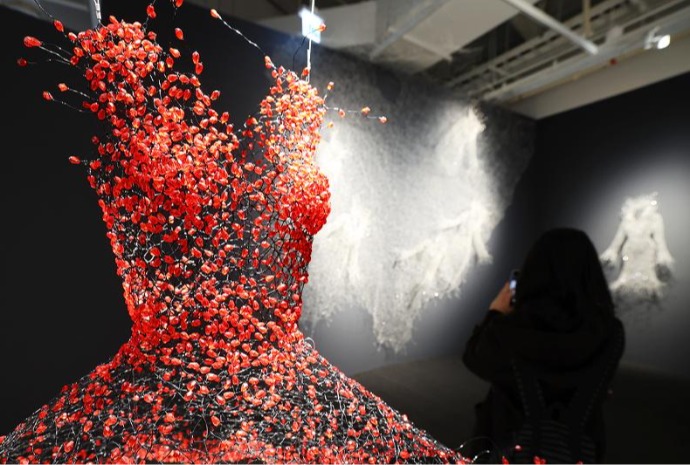 Merging traditional crafts with modern fashion art