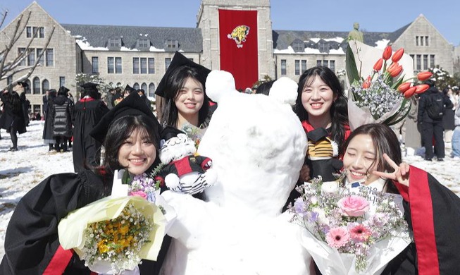 Celebrating college graduation with snowman