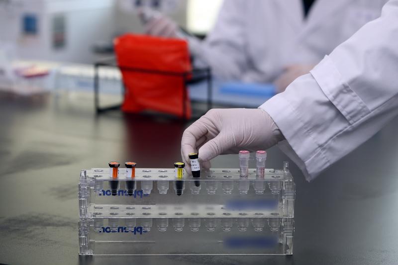 The country from Dec. 30 began to use a homegrown PCR test that can detect the omicron variant of COVID-19 in a confirmed case in just three to four hours. Shown here is a testing kit at Gwangju Health and Environment Research Institute in Gwangju.