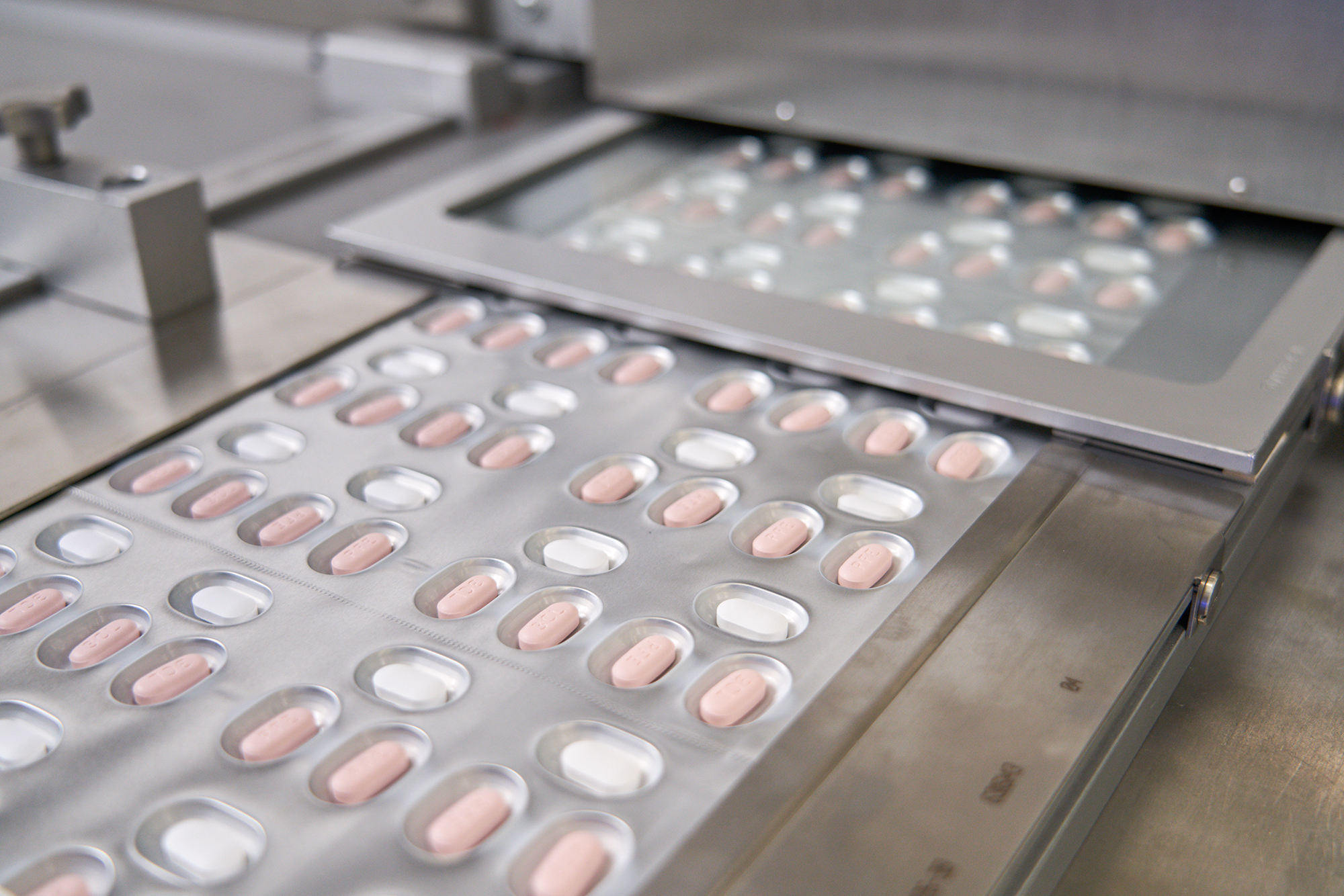 The government on Jan. 5 has finalized deals on additional oral drugs against COVID-19 for 400,000 people with Pfizer. Shown here is Pfizer's Paxlovid produced in Ascoli Piceno, Italy. (Pfizer) 