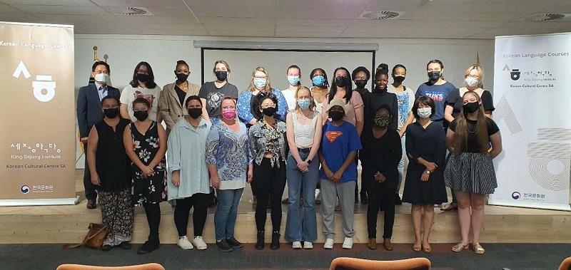 Students of Korean on March 28 pose for a group photo at a ceremony hosted by the Korean Culture Center in Pretoria, one of the three capitals of South Africa. 