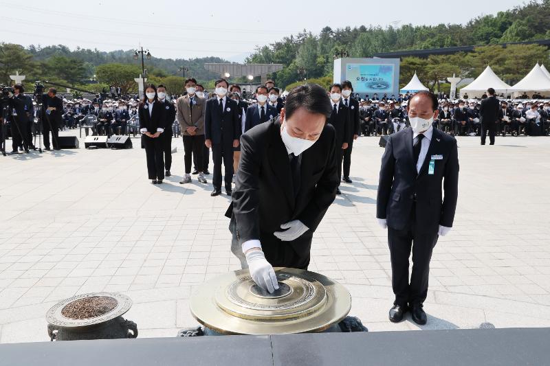 President Yoon Suk Yeol on the morning of May 18 pays his respects at the May 18th National Cemetery in Gwangju's Buk-gu District in the memorial ceremony for the 42nd anniversary of the May 18 Gwangju Democratization Movement