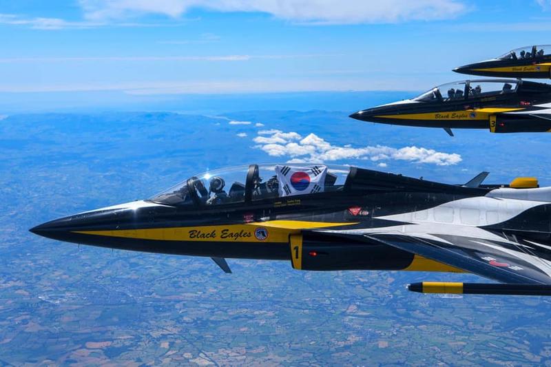 The Black Eagles, the Republic of Korea Air Force's aerobatic flight team, performs in the airshow Royal International Air Tattoo in the town of Fairford in the British county of Gloucestershire.