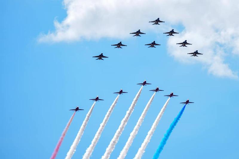 The Black Eagles performs high-level maneuvers at the Royal International Air Tattoo airshow in Fairford, a town in the county of Gloucestershire, the U.K.