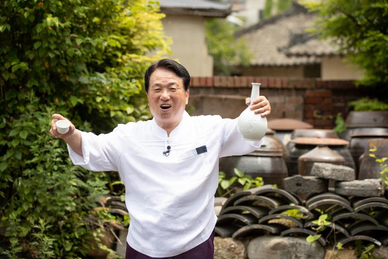 Leegangju master brewer Cho Jung Hyung shows off his drink at his distillery in Jeonju, Jeollabuk-do Province.