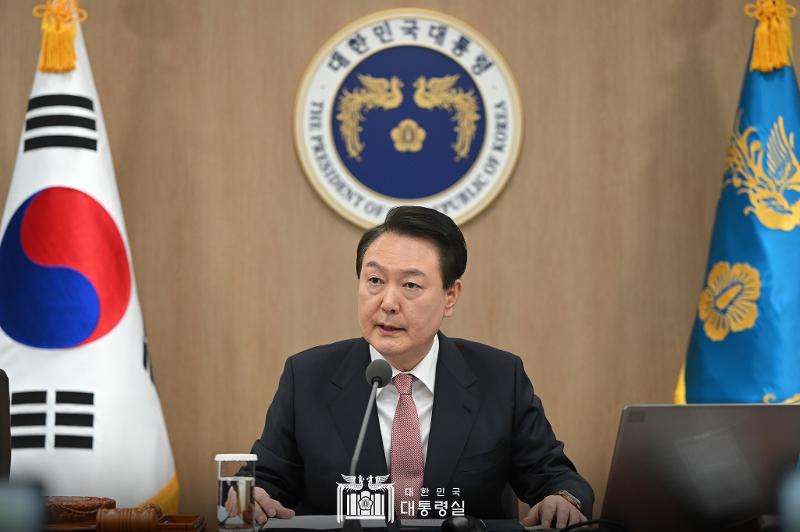President Yoon Suk Yeol on March 21 delivers his opening speech to the 12th Cabinet meeting at the presidential office in Seoul. (Facebook account of Office of the President) 