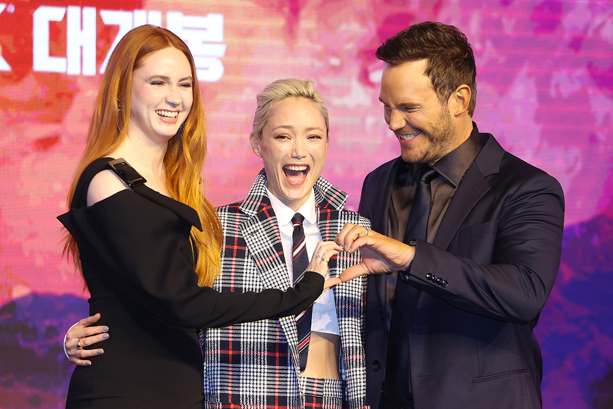 Hollywood actors Karen Gillan (left), Pom Klementieff (center) and Chris Pratt on April 18 pose for a group photo at a news conference for the new Marvel movie 