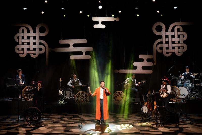 The fusion band Second Moon performs on stage.