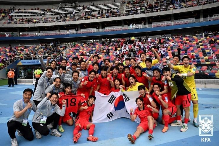 The men's under-20 (U-20) World Cup soccer team on June 4 takes a group photo after advancing to the semifinals at the stadium Estadio Unico Madre de Ciudades in Santiago del Estero, Argentina.