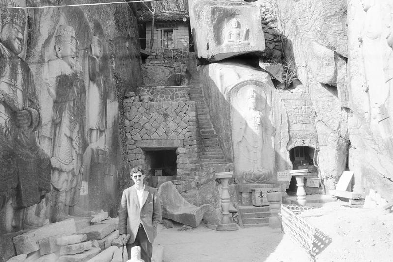 Gary Mintier poses in front of Seokbulsa Temple in Busan.