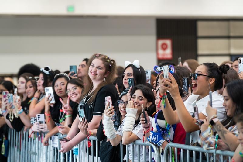 K-pop is the top attraction for those who visit Korea from abroad, according to a recent report. Shown are K-pop fans on Aug. 18 at the annual K-pop concert KCON LA at Crypto.com Arena and LA Convergence Center in Los Angeles. CJ ENM