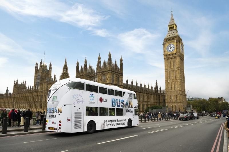 An LG Expo Bus inscribed with the slogan 