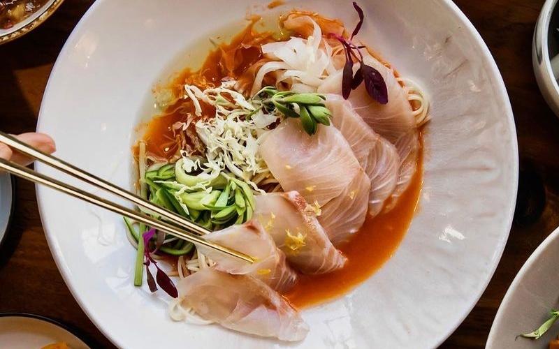 Mulhoemyeon (cold raw fish noodles) at Bansang, a fusion Hansik restaurant in San Francisco, is among 