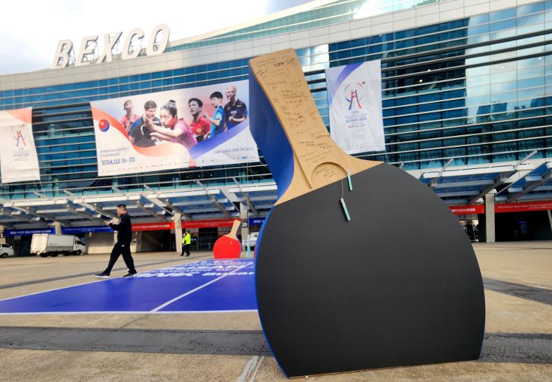 'Busan hosts this year's World Table Tennis Championships from Feb. 16-25 at the Busan Exhibition and Convention Center (BEXCO) in Busan's Haeundae-gu District. Shown is a large sculpture of a paddle in front of BEXCO Plaza. (Yonhap News) 