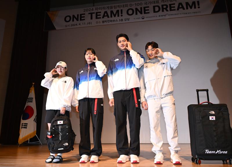 Members of the Olympic team on April 17 show their uniforms to be worn at this year's Paris Summer Olympics at the 