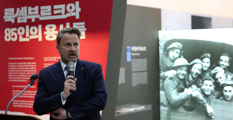 Luxembourg Deputy Prime Minister and Minister of Foreign Affairs Xavier Bettel on July 2 explains the significance of the exhibition 