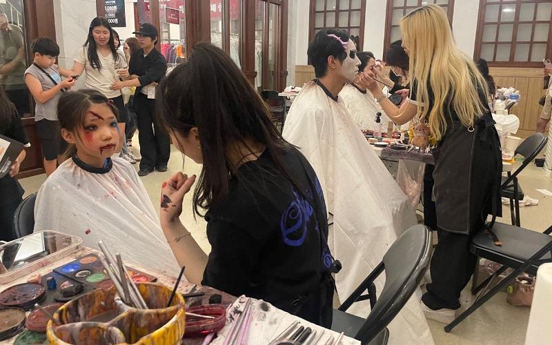Participants in a dressing and makeup room during the Park Awake event on Aug. 15. 