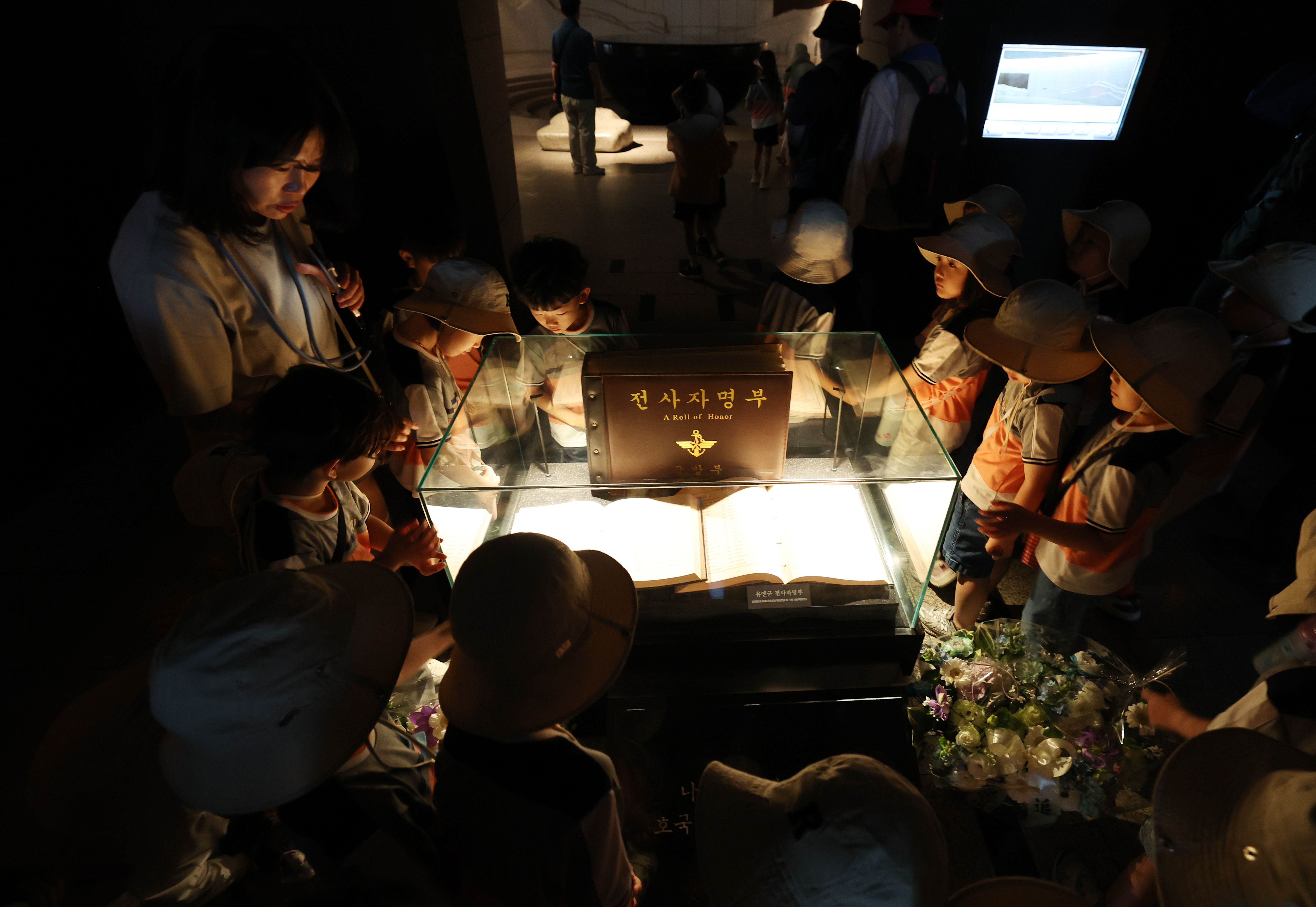 Children on June 5, the day before Memorial Day, look at a list of soldiers who died in the Korean War (1950-53) at the Memorial Hall of the War Memorial of Korea. .