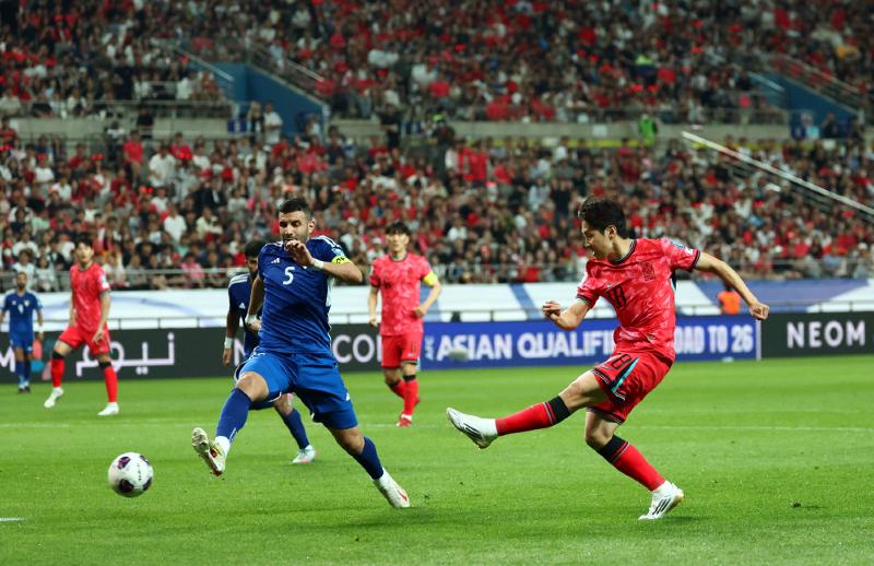 Striker Lee Kang-in (right) on June 10 scores the second goal of the national soccer team against Kuwait in Korea's final qualifier for the 2026 FIFA World Cup at Seoul World Cup Stadium in the city's Mapo-gu District. (Yonhap News)  