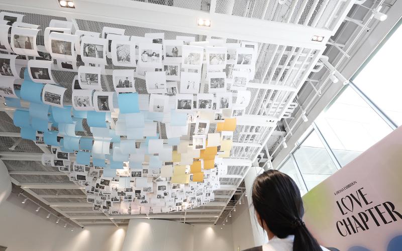 Black and white photos of scenes from K-dramas are displayed on the ceiling of the first floor lobby at the historical museum Cheongwadae Sarangchae in Seoul's Jongno-gu District.