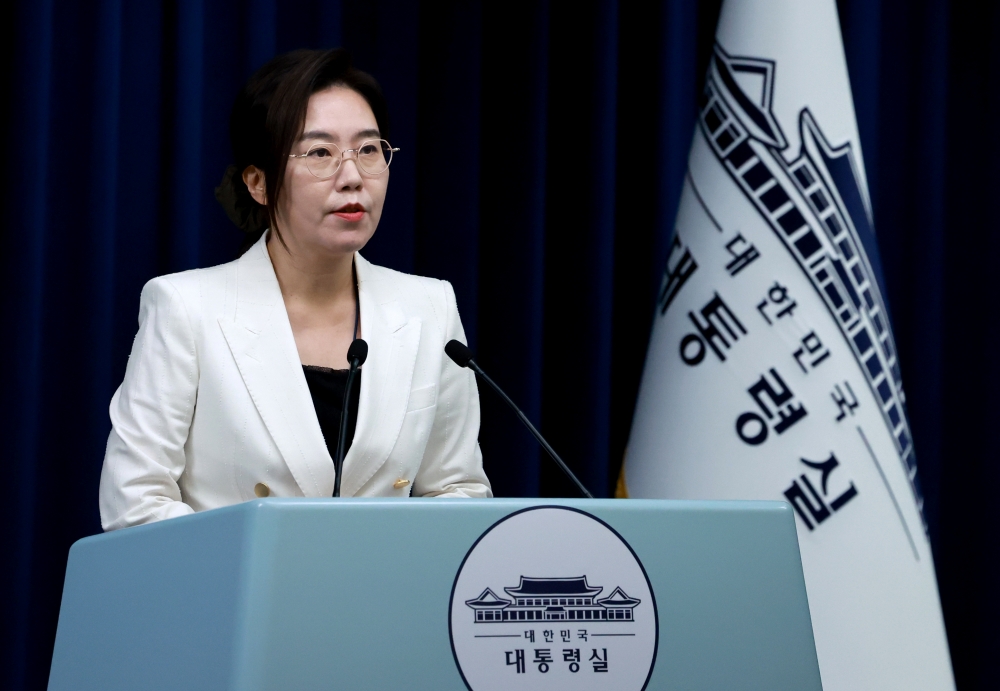 Presidential spokesperson Kang Yu-jung on Aug. 12 holds a news briefing at the Office of the President in Seoul on the Aug. 25 bilateral summit with the U.S. (Yonhap News)  