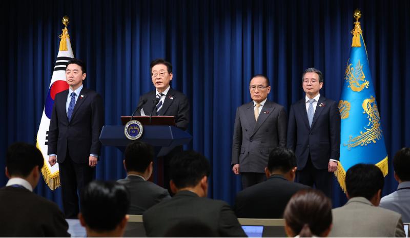 President Lee Jae Myung (second from left) on Dec. 3 gives a statement at the Office of the President in Seoul to mark the first anniversary of the failed attempt to impose an emergency martial law that occurred on Dec. 3, 2024. From left are Presidential Chief of Staff Kang Hoon-sik, President Lee, National Security Office Director Wi Sung-lac and Presidential Chief of Staff for Policy Kim Yong-beom. 