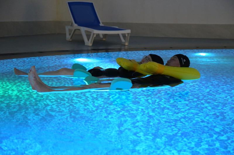 Participants in a meditation program at Wando Marine Healing Center in Wando-gun County, Jeollanam-do Province, listen to their inner voices while floating in a pool. 