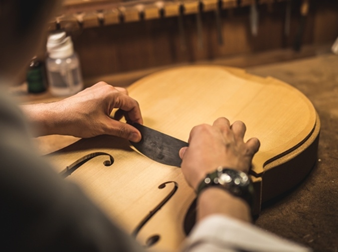 Microorganisms used to improve sound of string instruments