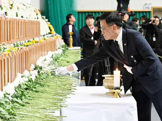 Scaled-down New Year's events to mourn plane crash victims